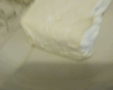 Foto del paso 3 de la receta: Gelatina de agua sabor naranja con queso philadelphia a lo Carmelita