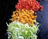 A picture of step 2 of Mix veggies and chicken soup.