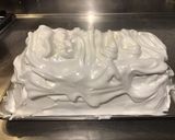 A picture of step 18 of Baked Alaska Flambéed with Rum.