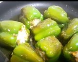 A picture of step 5 of Cheesy and Spicy Stuffed Capsicum stuffed capsicum(bell Pepper).