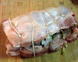 A picture of step 5 of spinach and pepper stuffed pork loin with parmesan potato wedges and mixed veggies.