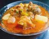 A picture of step 4 of Aloo Gosht with three Spices.