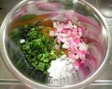 A picture of step 1 of Rolled Omelette with Kamaboko Fish Cakes and Green Onions for Lunchboxes.