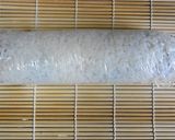A picture of step 7 of California Rolls (perfect for guests).