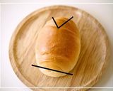 A picture of step 1 of Totoro Sandwich using a Bread Roll.
