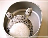 A picture of step 5 of Totoro Rice Balls.