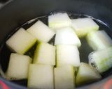 A picture of step 2 of Simmered Winter Melon, Imitation Crab and Okra.