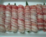 A picture of step 5 of Asparagus in Chikuwa Wrapped in Pork Belly.