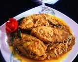 A picture of step 5 of Shorshe Ilish (Hilsa in mustard gravy).