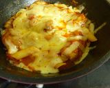 A picture of step 7 of Chicken Simmered in Tomato Sauce with Cheese and Penne.