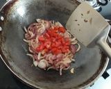 A picture of step 2 of Bittergourd tomato dry curry.