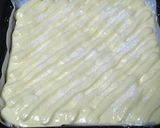 A picture of step 6 of Petit Strawberry Roll Cake with Ladyfinger Biscuit Crust.