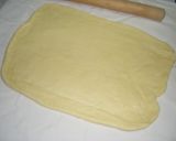 A picture of step 2 of Honey Cream Coiled Rolls.