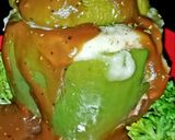 A picture of step 8 of Mike's Stuffed Cheesy Meaty Bell Peppers With Gravy.