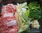A picture of step 1 of Stamina Building Garlic Shoots & Pork Belly Miso Stir-fry.