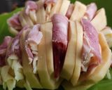Foto del paso 2 de la receta: Papas acordeón rellenas con queso y panceta 🥔🧀🥓