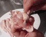 A picture of step 4 of Chicken Wing Gyoza (with chicken de-boning instructions).