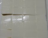 A picture of step 5 of From a Professional Chef: Prepare Silken Tofu for Mapo Doufu.