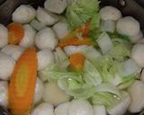 Hình bước làm 5 của món Canh Cải Nấu Cá Viên
