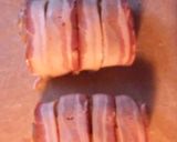 A picture of step 6 of Bacon wrapped stuffed Pork chops.