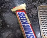 A picture of step 1 of Snickers chocolate Milk shake.