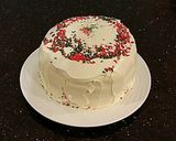A picture of step 15 of Vanilla Christmas Layer Cake with Creamy Vanilla Buttercream Frosting.