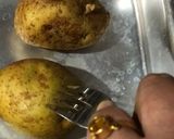 A picture of step 1 of Double Baked Potato-Egg Jackets.