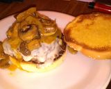 A picture of step 5 of Cream cheese stuffed burgers this glazed onions and mushrooms.