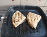 A picture of step 4 of Aloo paratha wrap.