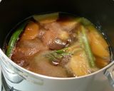 A picture of step 3 of The Meat is Fall-Apart Tender! Daikon Radish and Spareribs Simmered with Kimchi.