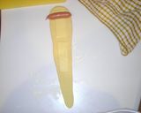 A picture of step 3 of Cheese Wiener Sausage Wraps.