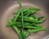 A picture of step 2 of Simmered Spring Potatoes and Green Beans.