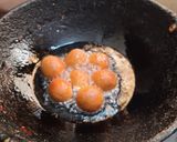 A picture of step 4 of Bread Gulab Jamun.