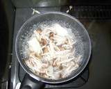 A picture of step 3 of A filling Miso Soup with Cabbage, Shimeji, and Eggs.