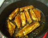 A picture of step 8 of Asian-Flavored Spicy Chicken Wings.