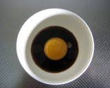 A picture of step 1 of Pork and Asparagus Tossed in Egg Yolk and Soy Sauce.
