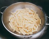 Foto del paso 2 de la receta: Penne rigate con salsa de rúcula y pomodoro cherry
