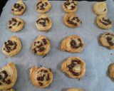 A picture of step 4 of Bite-Sized Chocolate Chip Pies with Frozen Puff Pastry.