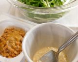 A picture of step 1 of Natto & Mizuna Salad.