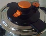 A picture of step 3 of Authentic Persimmon Jam in a Pressure Cooker.