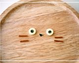 A picture of step 4 of Totoro Sandwich using a Bread Roll.