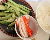 A picture of step 2 of California Rolls with Salmon and Cream Cheese.