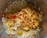 A picture of step 6 of Alu Aur Tamatar Pulao Potato and Tomato Pilaf.