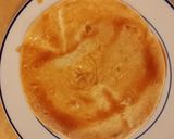 A picture of step 9 of Taisen's beef and bean enchiladas.