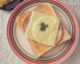 A picture of step 4 of Garlic Butter Soy Sauce Ham & Cheese Toast.