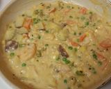 A picture of step 9 of Fish and Shrimp Potpie.