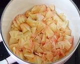 A picture of step 7 of Pink Hued Apple Jam using Red Gold Apples.