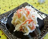A picture of step 7 of Simple Daikon Radish & Crab Stick Salad.