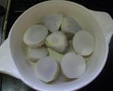 A picture of step 3 of Piping Hot Taro Root Baked in Cheese.
