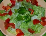 A picture of step 2 of Caesar saled with beef and a twist.